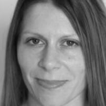 Black and white, head shot of Dr Bonnie Evans.