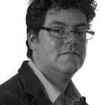 Black and white, head and shoulders portrait of Professor David Turner