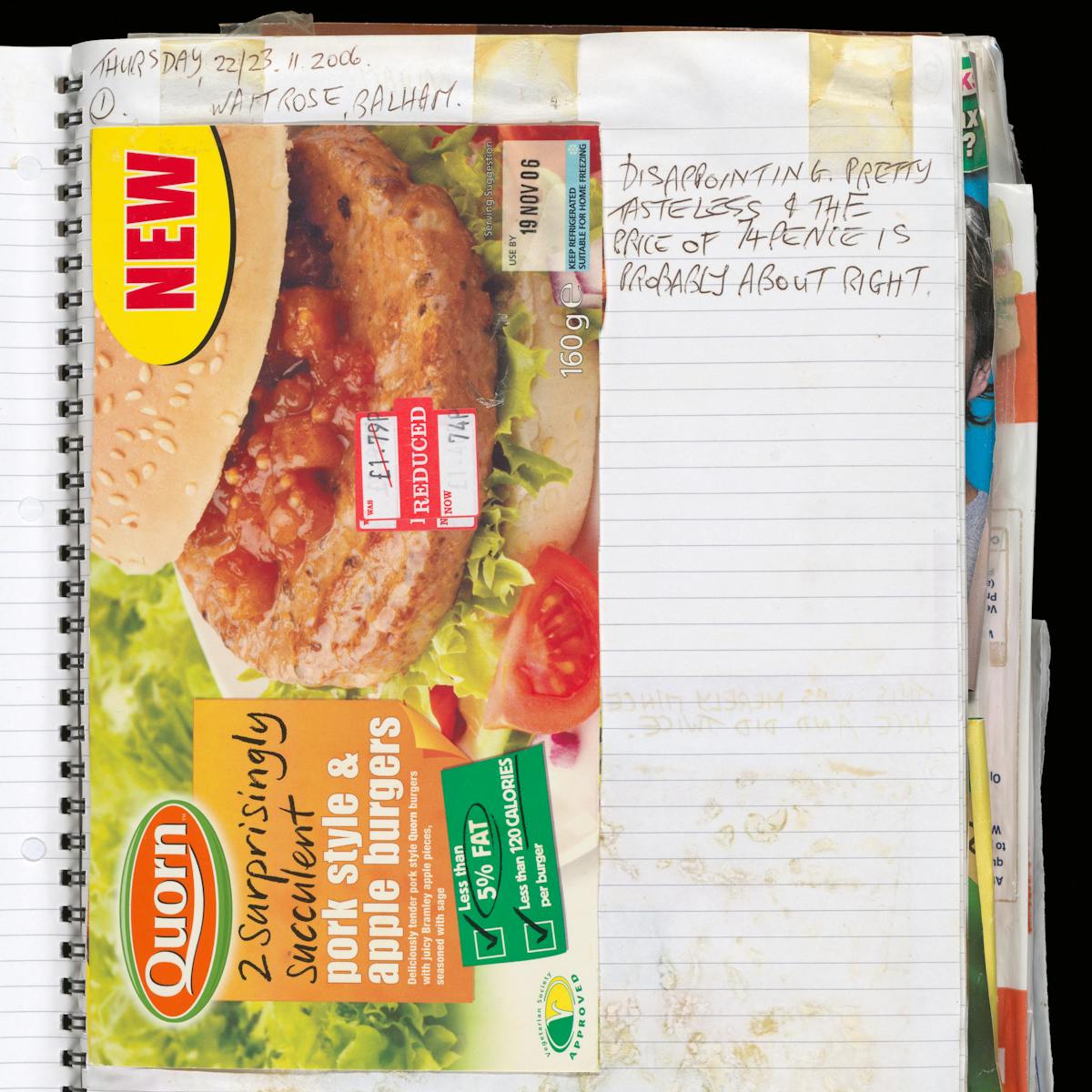 Photograph of a detail of a page inside a scrapbook. Pasted inside is the packaging of a supermarket burger with a reduced price of 74p showing on a red sticker. The page is dated "Thursday 22/23.11.2006" and has the words "Disappointing. Pretty tasteless and the price of 74 pence is probably about right".