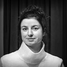 Photographic black and white, head and shoulders portrait of Emma Smith.