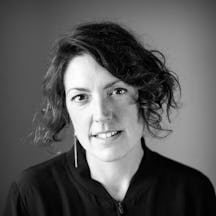 Photographic black and white, head ans shoulders portrait of Abbie Trayler-Smith.