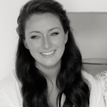 Black and white, head and shoulders photographic portrait of Caroline Butten